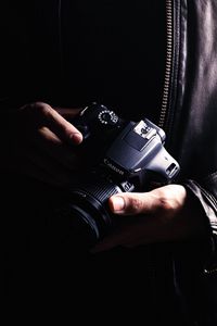 Preview wallpaper camera, objective, photographer, hands, dark