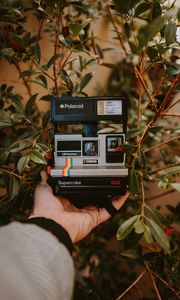 Preview wallpaper camera, polaroid, hand, retro