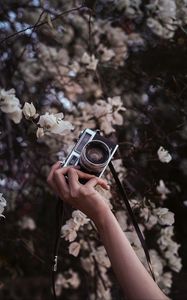 Preview wallpaper camera, retro, hand, flowers, bloom