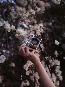 Preview wallpaper camera, retro, hand, flowers, bloom