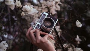 Preview wallpaper camera, retro, hand, flowers, bloom