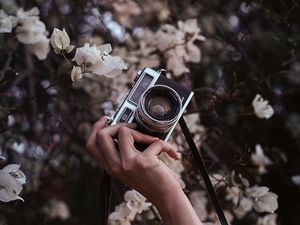 Preview wallpaper camera, retro, hand, flowers, bloom