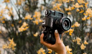 Preview wallpaper camera, retro, hand, flowers, tattoo