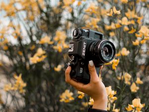 Preview wallpaper camera, retro, hand, flowers, tattoo