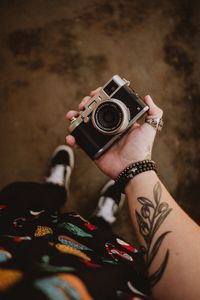 Preview wallpaper camera, retro, vintage, arm, tattoo, legs