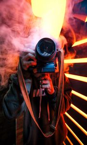 Preview wallpaper camera, smoke, photographer, lens, neon, light