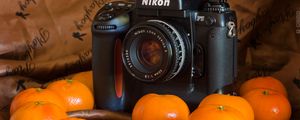 Preview wallpaper camera, tangerines, fabric