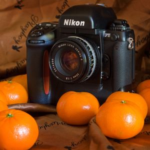 Preview wallpaper camera, tangerines, fabric