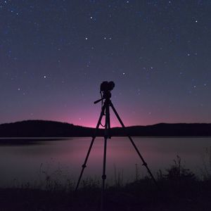 Preview wallpaper camera, tripod, lake, night, dark