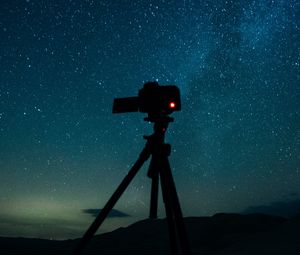 Preview wallpaper camera, tripod, starry sky, stars