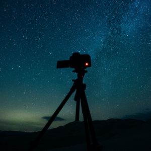 Preview wallpaper camera, tripod, starry sky, stars