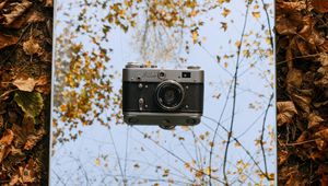 Preview wallpaper camera, vintage, retro, autumn, leaves