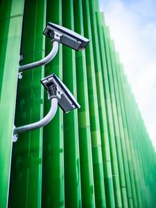 Preview wallpaper cameras, fence, green, metal