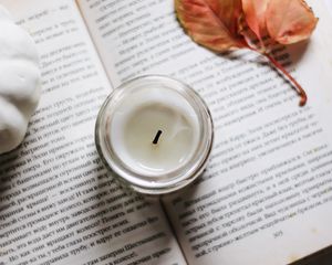 Preview wallpaper candle, book, text, sheet