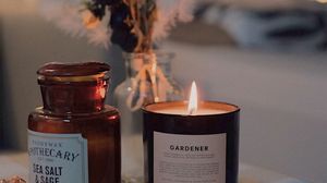 Preview wallpaper candle, bouquet, flowers, aesthetics