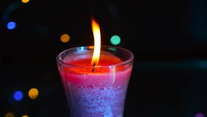 Preview wallpaper candle, fire, light, bokeh, colorful, dark