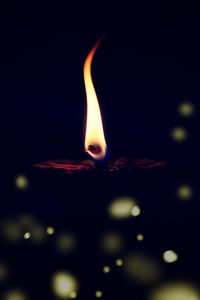 Preview wallpaper candle, flame, fire, glare, blur, dark