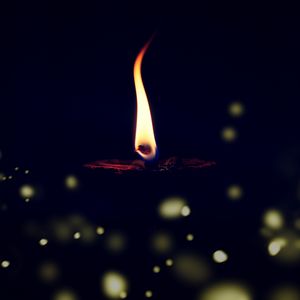 Preview wallpaper candle, flame, fire, glare, blur, dark