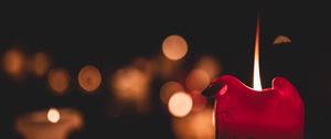 Preview wallpaper candle, flame, fire, red, blur, dark