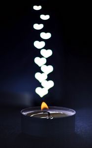 Preview wallpaper candle, flame, heart, glare