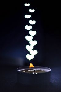 Preview wallpaper candle, flame, heart, glare