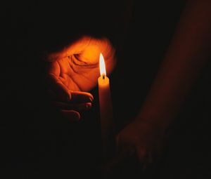 Preview wallpaper candle, hands, flame, dark