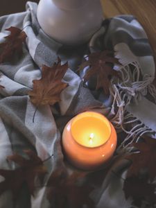 Preview wallpaper candle, leaves, autumn, fabric, flame