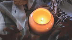 Preview wallpaper candle, leaves, autumn, fabric, flame