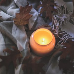 Preview wallpaper candle, leaves, autumn, fabric, flame