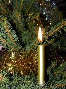 Preview wallpaper candle, pine needles, tree, toys, tinsel, holiday