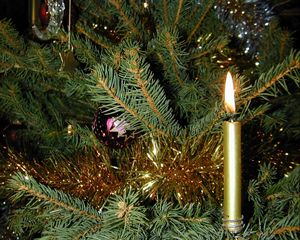 Preview wallpaper candle, pine needles, tree, toys, tinsel, holiday