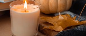 Preview wallpaper candle, pumpkin, leaf, books