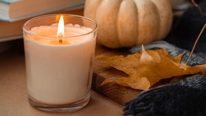 Preview wallpaper candle, pumpkin, leaf, books