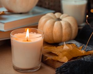 Preview wallpaper candle, pumpkin, leaf, books
