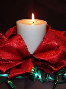 Preview wallpaper candle, ribbons, bows, fire