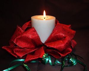 Preview wallpaper candle, ribbons, bows, fire