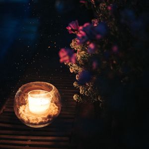 Preview wallpaper candle, sparks, flowers, night, dark