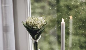 Preview wallpaper candle, window, bouquet, rain, books, plaid, cup