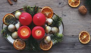 Preview wallpaper candles, christmas, spruce, oranges