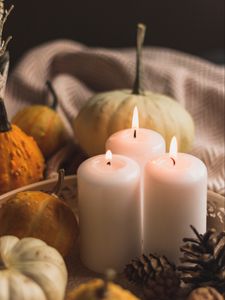 Preview wallpaper candles, flame, pumpkins, cones, cloth