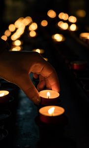 Preview wallpaper candles, hand, dark