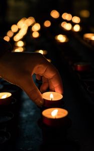 Preview wallpaper candles, hand, dark