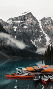 Preview wallpaper canoe, boats, lake, pier, mountains