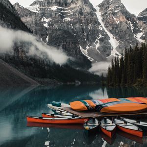 Preview wallpaper canoe, boats, lake, pier, mountains