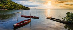 Preview wallpaper canoe, sea, rays, slope, nature, landscape