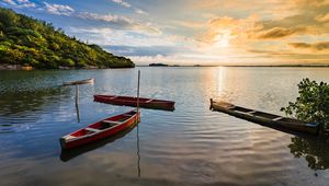 Preview wallpaper canoe, sea, rays, slope, nature, landscape