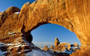 Preview wallpaper canyon, arch, window, snow, stones, mountains