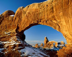 Preview wallpaper canyon, arch, window, snow, stones, mountains