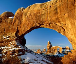 Preview wallpaper canyon, arch, window, snow, stones, mountains