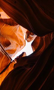 Preview wallpaper canyon, cave, rocks, sandy, bottom view, sky